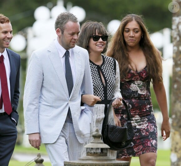 Lily Allen et son mari Sam Cooper au mariage du rappeur Stephen Paul Manderson alias Professor Green et Millie Mackintosh dans le Somerset, le 10 septembre 2013.