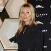 Kate Moss assiste à l'inauguration de la nouvelle boutique Longchamp sur Regent Street. Londres, le 14 septembre 2013.