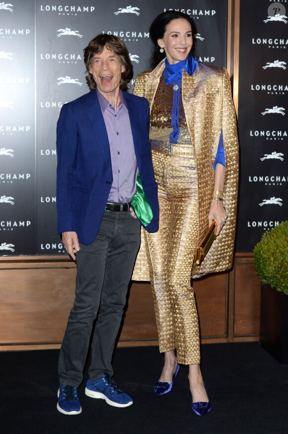 Mick Jagger et L'Wren Scott assistent à l'inauguration de la nouvelle boutique Longchamp sur Regent Street. Londres, le 14 septembre 2013.