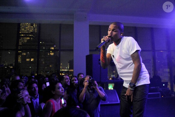 Pharrell Williams à la soirée Calvin Klein pour le parfum Downtown à New York le 13 septembre 2013