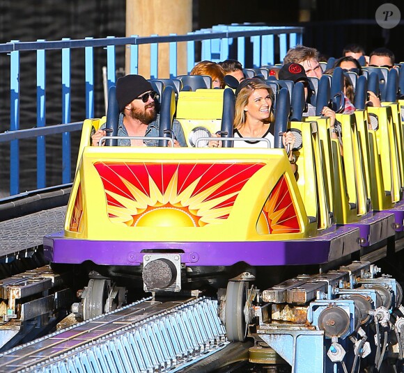 Exclusif - Aaron Paul et sa femme Lauren Parsekian s'amusent à Disneyland. Le 17 septembre 2013 en Californie.
