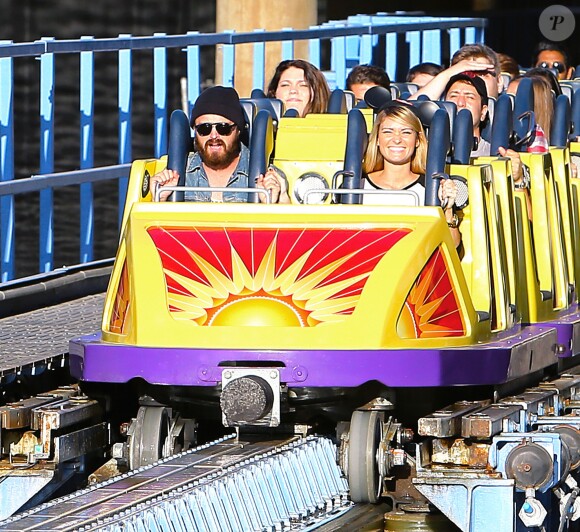 Exclusif - Aaron Paul et sa femme Lauren Parsekian s'amusent à Disneyland. Le 17 septembre 2013 en Californie.