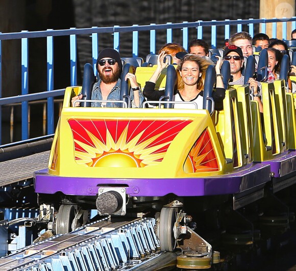 Exclusif - Aaron Paul et sa femme Lauren Parsekian s'amusent à Disneyland. Le 17 septembre 2013 en Californie.