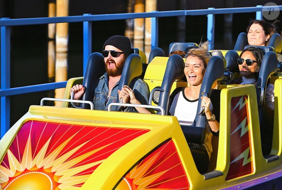 Exclusif - Aaron Paul et sa femme Lauren Parsekian s'amusent à Disneyland. Le 17 septembre 2013 en Californie.