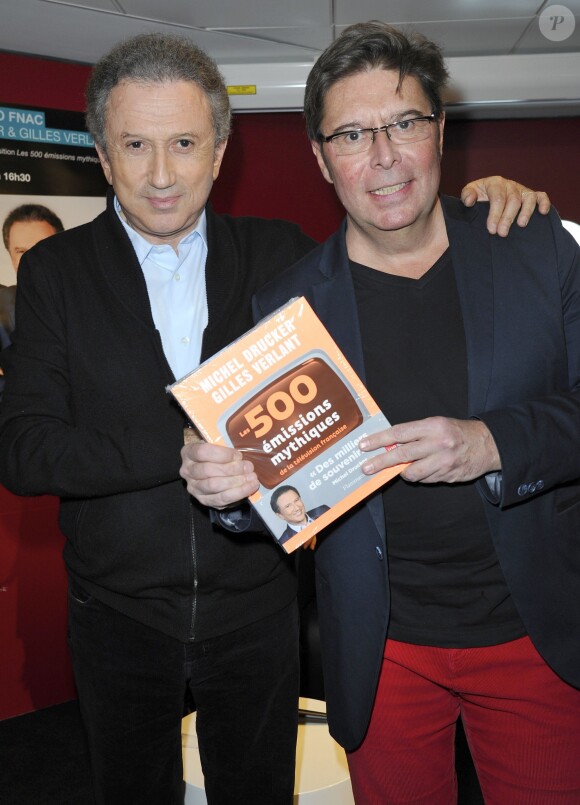Michel Drucker et Gilles Verlant à Paris le 1er Decembre 2012.