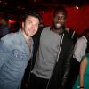 Michaël Youn et Omar Sy à la soirée de lancement de FIFA 14, organisée à la Gaîté Lyrique, à Paris, le 23 septembre 2013. La simulation de foot d'EA Sports sort le 26 septembre.