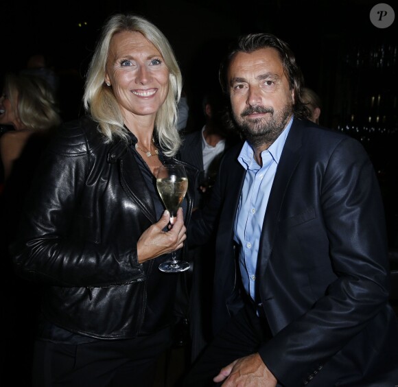 Henri Leconte et sa femme Florentine à la soirée J'aime la MOde le 23 septembre 2013 à Paris.