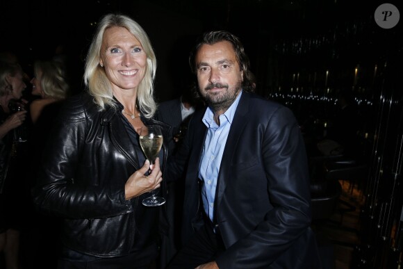Henri Leconte et sa femme Florentine à la soirée J'aime la MOde le 23 septembre 2013 à Paris.