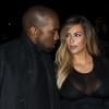 Kim Kardashian et Kanye West arrivent au défilé Givenchy le 28 septembre 2013 à Paris