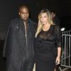 Kim Kardashian et Kanye West arrivent au défilé Givenchy le 28 septembre 2013 à Paris
