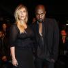 Kanye West et Kim Kardashian, lookés, arrivent au défilé Givenchy à Paris le 28 septembre 2013
