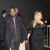 Kim Kardashian et Kanye West arrivent au défilé Givenchy à Paris le 28 septembre 2013