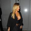 Kim Kardashian, ultra sexy, quitte le Publicis Drugstore après la projection du film Mademoiselle C. Paris, le 1er octobre 2013.