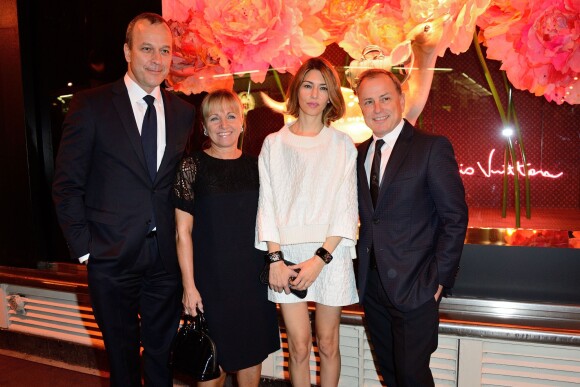 Sofia Coppola et Michael Burke lors du cocktail organisé par Louis Vuitton afin de présenter le nouveau sac de la maison, le SC Bag. Au Bon Marché, le 1er octobre 2013.
