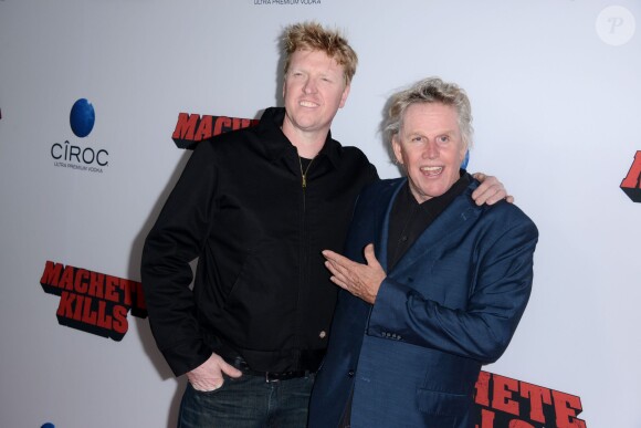 Gary Busey et son fils Jake Busey lors de la première de Machete Kills aux Regal Cinemas de Los Angeles, le 2 octobre 2013.