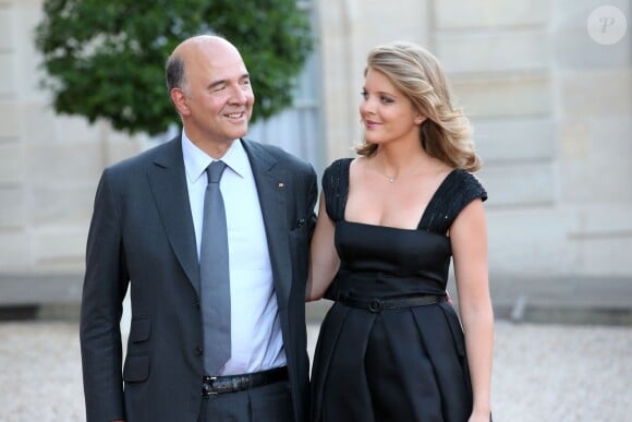 Pierre Moscovici et sa compagne Marie-Charline Pacquot à l'Elysee le 3 septembre 2013.