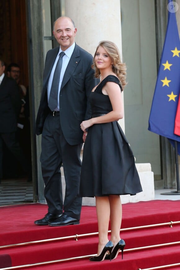 Pierre Moscovici et sa compagne Marie-Charline Pacquot - Diner en l'honneur de Mr Joachim Gauck president federal d'Allemagne au palais de l'Elysee a Paris le 3 septembre 2013.