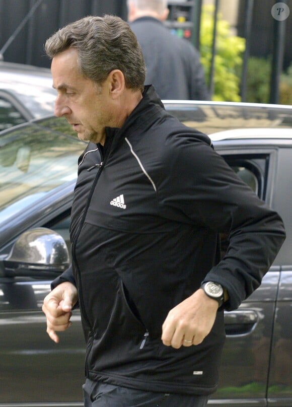 Nicolas Sarkozy pendant son jogging avenue Foch à Paris, le 8 octobre 2013.