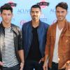 Les Jonas Brothers à la cérémonie des Teen Choice Awards 2013 au Gibson Amphitheatre à Universal City. Le 11 août 2013.