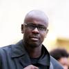 Lilian Thuram promu au grade d'Officier de la Légion d'honneur par le président de la République François Hollande au palais de l'Elysée à Paris le 17 septembre 2013
