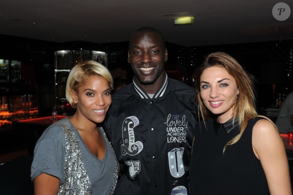 Ladji Doucouré entourée de Audrey Chaveau et Ariane Brodier lors de la soirée au VIP Room qui donnait le coup d'envoi de la nouvelle édition des Etoiles du Sport, le 16 octobre 2013 à Paris