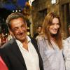 Nicolas Sarkozy et son épouse Carla Bruni-Sarkozy au concert de leur ami Julien Clerc au festival de Ramatuelle, le 3 août 2013.