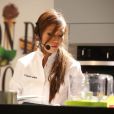 Nathalie Nguyen (MasterChef 2011) lors d'une battle gourmande opposant des candidats de Top Chef à ceux de MasterChef au 19ème Salon du chocolat 2013 à la Porte de Versailles à Paris le 29 octobre 2013