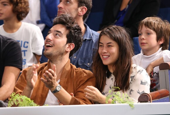 Mylène Jampanoï et son compagnon Dimitri Stephanides au Masters de Paris à Bercy le 2 novembre 2013, lors des demi-finales Djokovic-Federer et Nadal-Ferrer