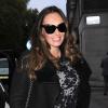 Tamara Ecclestone, enceinte, accompagnée de sa soeur Petra et sa fille Lavinia lors d'une session shopping à Londres le 7 novembre 2013