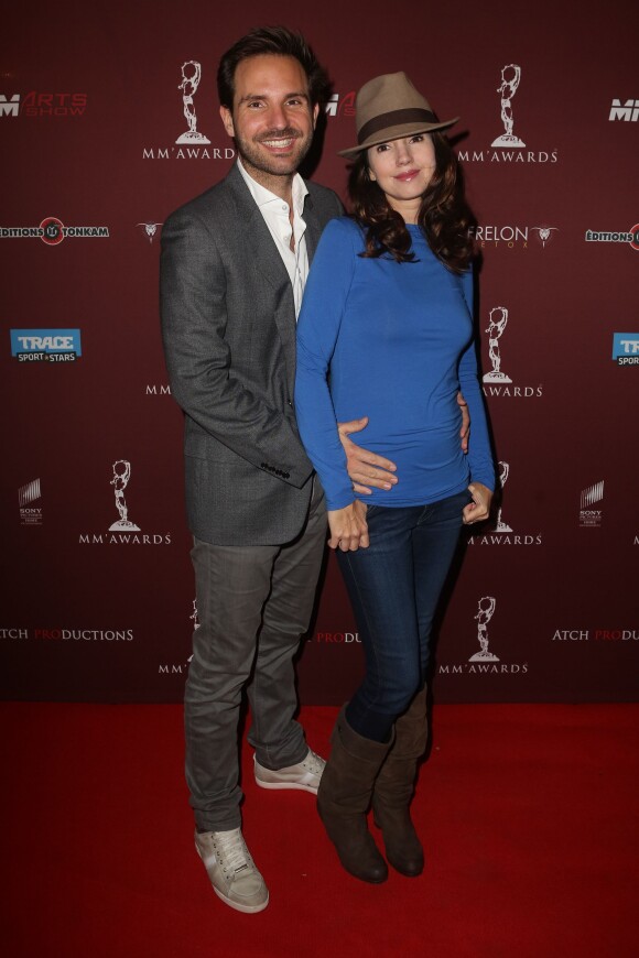 Christophe Michalak et sa femme Delphine McCarty, enceinte de quelques semaines, à Paris le 10 novembre 2013, aux premiers MM'Awards.