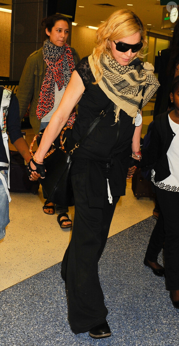 Madonna et ses enfants David, Mercy et Lourdes arrivent à New York en provenance de Londres, le 3 septembre 2013.