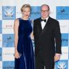 La princesse Charlene de Monaco et son époux le prince Albert II de Monaco au Diner de gala annuel de charité MONAA (Monaco Against Autism) au Sporting Club de Monaco. Le 15 Novembre 2013.