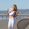 La playmate Dani Mathers réalise un shooting pour le magazine Playboy, en vue du numéro de janvier 2014, dont elle fera la couverture. Sur la plage de Los Angeles, le jeudi 14 novembre 2013.