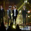 Harry Styles et son groupe One Direction sur la scène des 41e American Music Awards au Nokia Theatre de Los Angeles, le 24 novembre 2013.