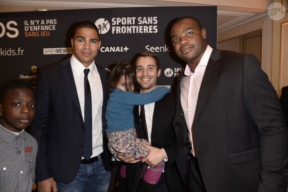 Daniel Narcisse et Robins Tchale-Watchou le 20 novembre 2013 à Paris au dîner de gala en soutien à All4kids et Sports Sans Frontières au Shangri-La Hotel.