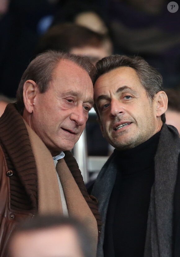 Bertrand Delanoë et Nicolas Sarkozy au Parc des Princes à Paris le 1er decembre 2013 lors du match entre le PSG et l'OL (4-0).