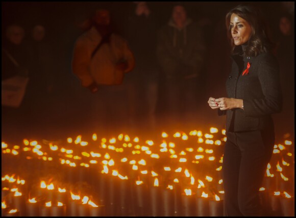 La princesse Marie a allumé un des cierges rendant hommage aux personnes décédées du sida après un concert spécial en l'église de la Trinité de Copenhague à l'occasion de la Journée mondiale de la lutte contre le sida, le 1er décembre 2013
