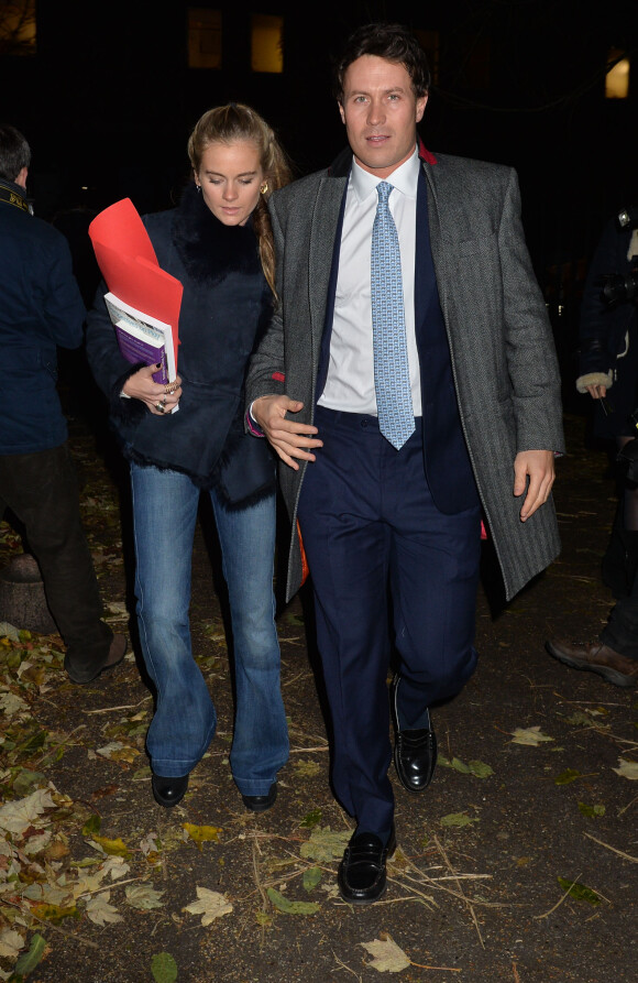 Cressida Bonas, girlfriend du prince Harry, accompagnée par un ami à un concert de Noël en l'église Saint Luc à Londres le 4 décembre 2013. Une soirée à la mémoire du défunt Henry van Straubenzee, ami du prince Harry qui a trouvé la mort en 2002 à 18 ans dans un accident de voiture.