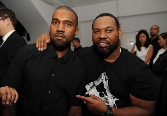 Kanye West et le rappeur Raekwon lors du Design Dialogues N°6, présenté par le magazine Surface. Miami, le 4 décembre 2013.