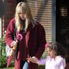 Heidi Klum et sa fille Lou Samuel quittent le restaurant Toscana dans le quartier de Brentwood. Los Angeles, le 7 décembre 2013.