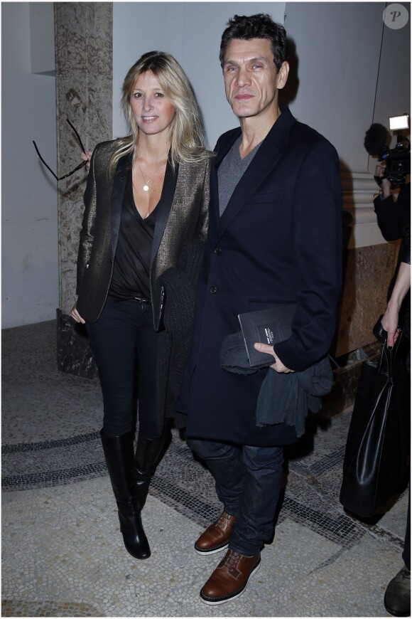 Marc Lavoine et sa femme Sarah Poniatowski  à la presentation de la collection Homme Yves Saint Laurent au Grand Palais, à Paris le 20 janvier 2013 Y