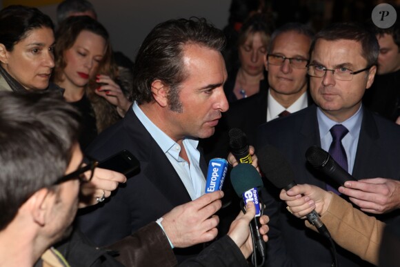 Jean Dujardin lors de la remise du prix polar "Quai des Orfèvres 2014" par l'acteur Jean Dujardin à Pairs le 12 novembre 2013. Il s'y était exprimé pour la première fois de sa rupture avec Alexandra Lamy