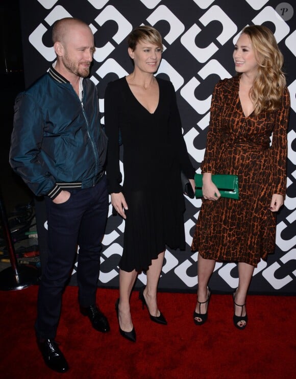 L'acteur Ben Foster, Robin Wright et sa fille, Dylan Penn, au vernissage de l'exposition consacrée à la créatrice Diane Von Furstenberg, à Los Angeles le 10 janvier 2014.