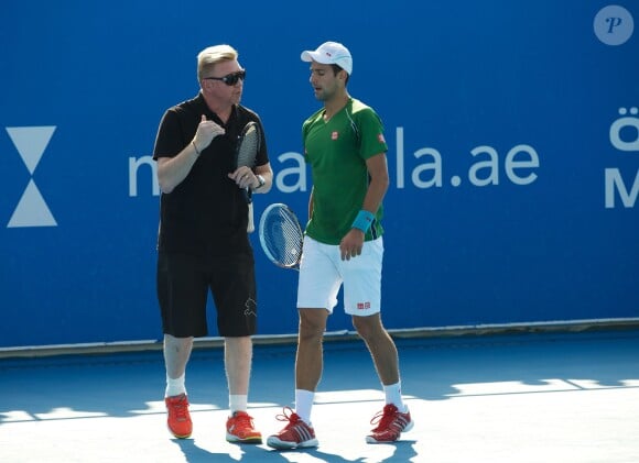 Novak Djokovic à l'entraînement sous la houlette de son nouveau head coach Boris Becker le 27 décembre 2013 à Abou Dhabi