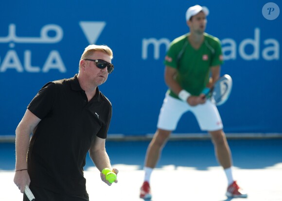 Novak Djokovic à l'entraînement sous la houlette de son nouveau head coach Boris Becker le 27 décembre 2013 à Abou Dhabi