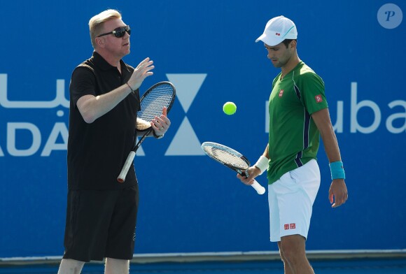 Novak Djokovic à l'entraînement sous la houlette de son nouveau head coach Boris Becker le 27 décembre 2013 à Abou Dhabi