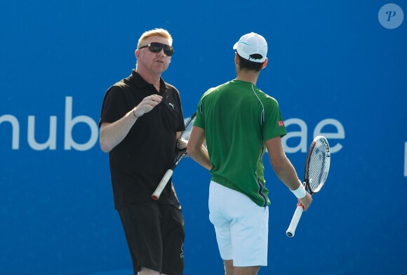 Novak Djokovic à l'entraînement sous la houlette de son nouveau head coach Boris Becker le 27 décembre 2013 à Abou Dhabi