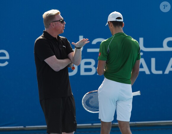 Novak Djokovic à l'entraînement sous la houlette de son nouveau head coach Boris Becker le 27 décembre 2013 à Abou Dhabi