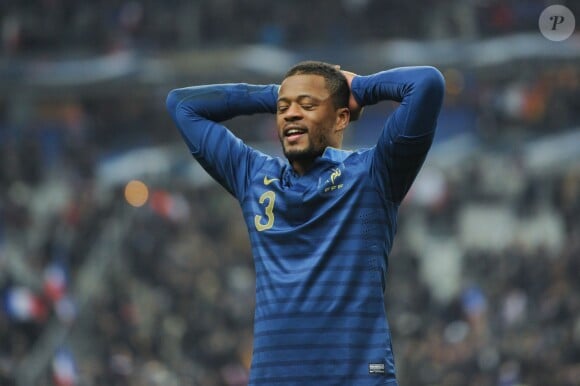 Patrice Evra après la victoire de la France face à l'Ukraine au Stade de France à Saint-Denis le 19 novembre 2013