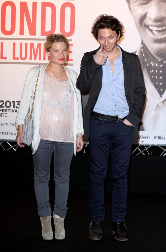 Mélanie Thierry enceinte de son deuxième enfant et son compagnon Raphaël lors de la soirée d'ouverture du Festival Lumière 2013 le 14 octobre